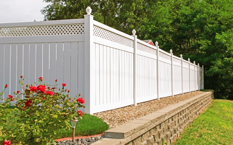 pvc-fence-above-retaining-wall